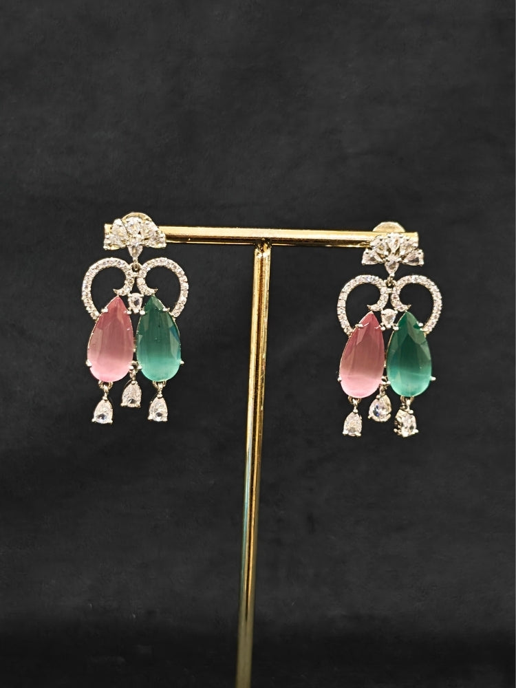 A beautiful artificial diamond necklace with colored stone and earrings set, ideal for festivals, family gatherings, and special celebrations in India. This elegant diamond jewelry provides the perfect blend of sparkle and tradition, with a modern twist.