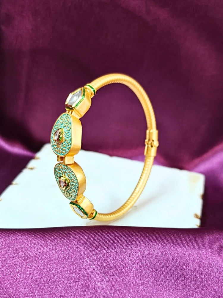 Close-up of an ornate traditional Mint Green Meenakari Bracelet with Meenakari, Kundan and Matt Finish. Festive outfit paired with a premium imitation Meenakari bracelet in India. Festive Diwali look enhanced with an imitation Meenakari bracelet.