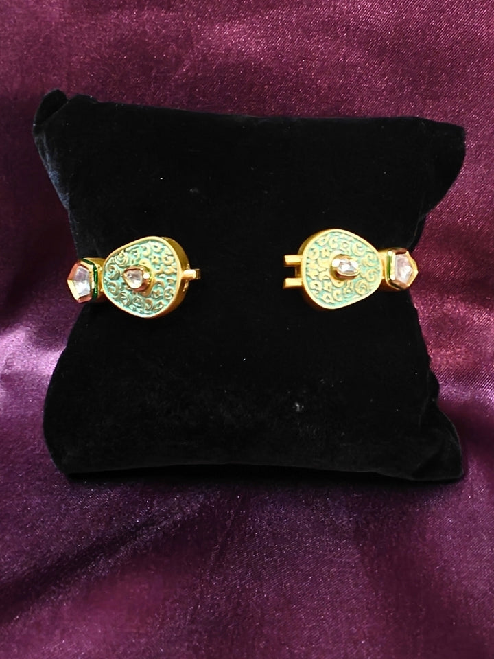 Close-up of an ornate traditional Mint Green Meenakari Bracelet with Meenakari, Kundan and Matt Finish. Festive outfit paired with a premium imitation Meenakari bracelet in India. Festive Diwali look enhanced with an imitation Meenakari bracelet.