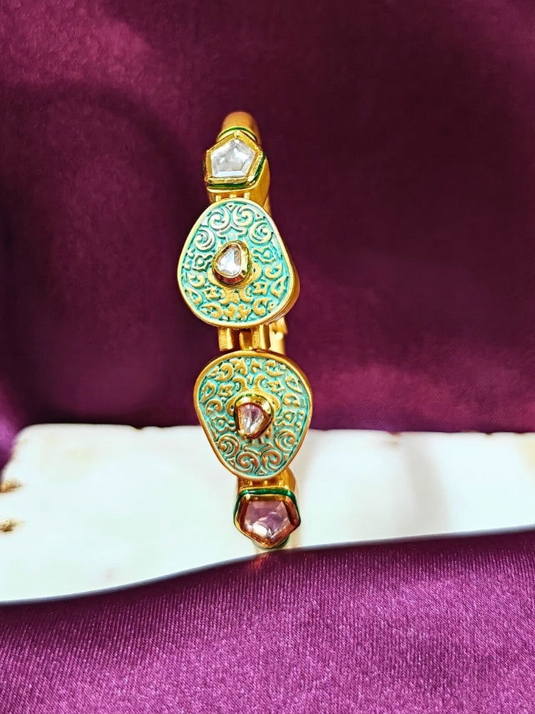 Close-up of an ornate traditional Mint Green Meenakari Bracelet with Meenakari, Kundan and Matt Finish. Festive outfit paired with a premium imitation Meenakari bracelet in India. Festive Diwali look enhanced with an imitation Meenakari bracelet.