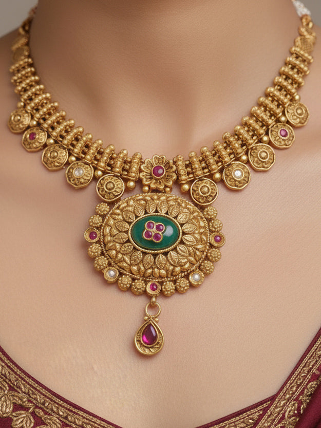 Close-up of a woman wearing an ornate traditional Heritage gold Collar jewellery set and earrings with Mint Green Colored Stones. Festive celebration outfit paired with a handcrafted heritage jewelry set.
Festive Diwali outfit styled with a royal heritage necklace.