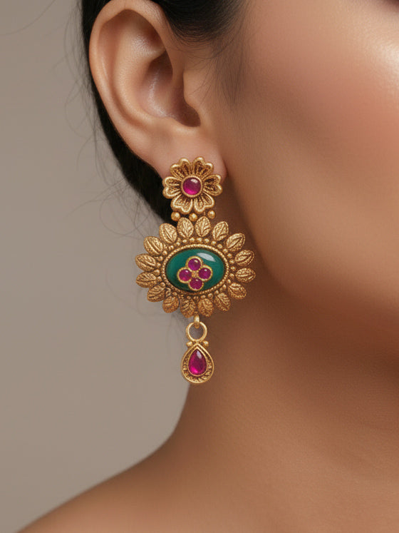 Close-up of a woman wearing an ornate traditional Heritage gold Collar jewellery set and earrings with Mint Green Colored Stones. Festive celebration outfit paired with a handcrafted heritage jewelry set.
Festive Diwali outfit styled with a royal heritage necklace.