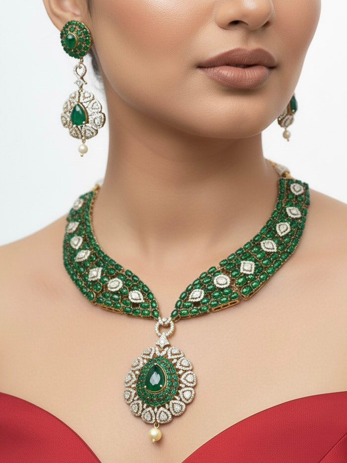 "Close-up of a model in luxurious artificial diamond jewelry featuring a designer diamond necklace, pota stone and green colored stone and earrings set, crafted for bridal fashion and high-end weddings. This beautiful diamond jewelry set offers the brilliance of real diamonds at an affordable price."
