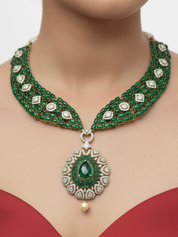 "Close-up of a woman wearing a sparkling artificial diamond, pota stone and green colored necklace and diamond earrings set, designed to offer a radiant, elegant look for any formal occasion or Indian wedding. This affordable diamond jewelry provides a flawless, luxurious alternative to natural diamonds."
