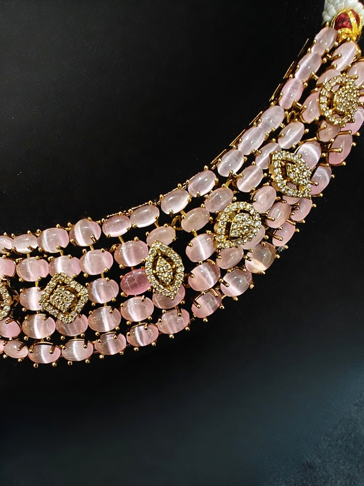 An exquisite artificial diamond, pota stone and mint pink colored stone necklace and matching earrings, designed for the perfect engagement look. This stunning artificial diamond jewelry set offers luxury and sophistication while being an affordable alternative to natural diamonds.