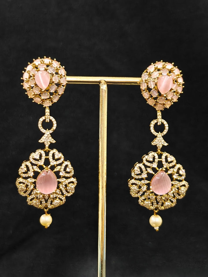 An exquisite artificial diamond, pota stone and mint pink colored stone necklace and matching earrings, designed for the perfect engagement look. This stunning artificial diamond jewelry set offers luxury and sophistication while being an affordable alternative to natural diamonds.