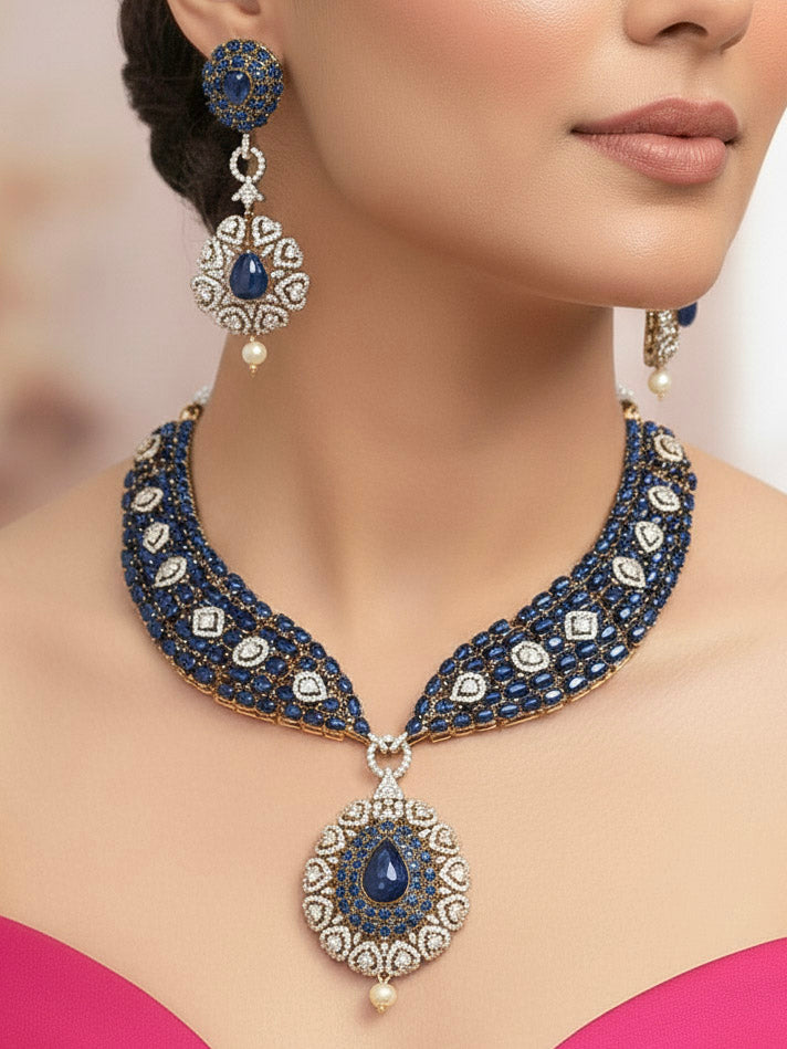 "A bride-to-be wearing an exquisite artificial diamond, pota stone and navy blue colored stone necklace and matching earrings, designed for the perfect engagement look. This stunning artificial diamond jewelry set offers luxury and sophistication while being an affordable alternative to natural diamonds."
