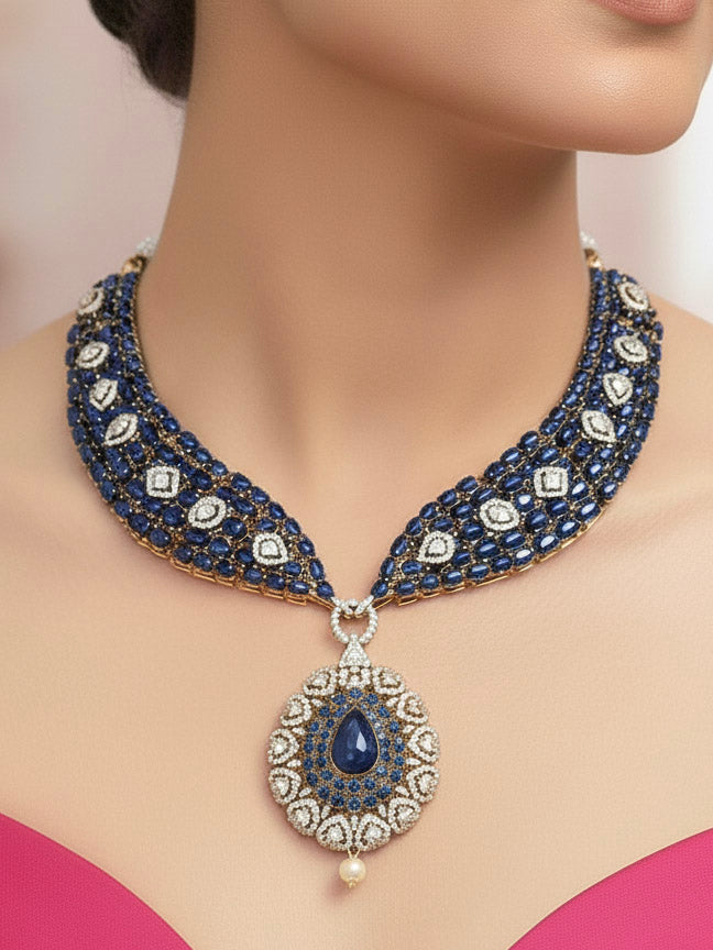 "A woman showcasing a beautiful artificial diamond, pota stone and navy blue colored stone necklace and earrings set, ideal for festivals, family gatherings, and special celebrations in India. This elegant diamond jewelry provides the perfect blend of sparkle and tradition, with a modern twist."