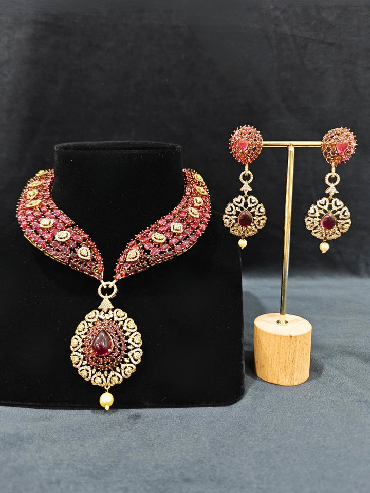 A luxurious artificial diamond and pota stone necklace with matching earrings, perfect for high-profile wedding receptions and formal galas. This high-end artificial diamond jewelry set combines style, elegance, and affordability for special occasions.