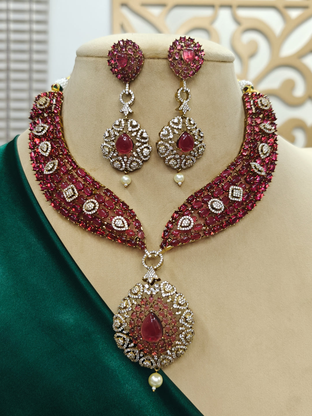 "A stunning woman wearing a glamorous artificial diamond and pota stone necklace paired with chic earrings, perfect for bridal wear. This high-quality artificial diamond jewelry set is the ideal choice for modern brides looking for a budget-friendly option with timeless sparkle."
