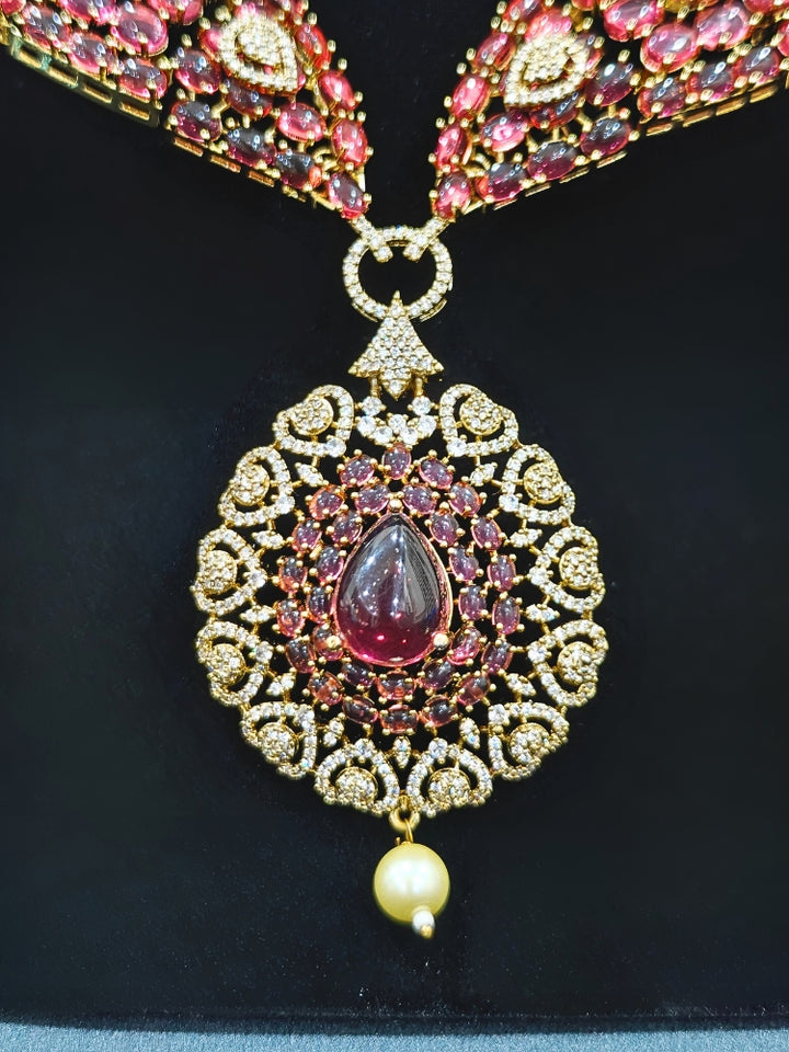 A luxurious artificial diamond and pota stone necklace with matching earrings, perfect for high-profile wedding receptions and formal galas. This high-end artificial diamond jewelry set combines style, elegance, and affordability for special occasions.