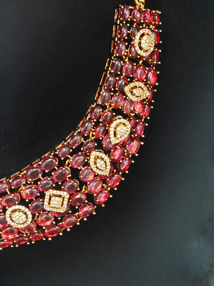 A luxurious artificial diamond and pota stone necklace with matching earrings, perfect for high-profile wedding receptions and formal galas. This high-end artificial diamond jewelry set combines style, elegance, and affordability for special occasions.