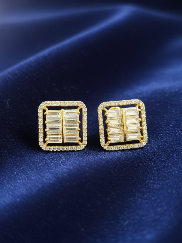 Close-up of an ornate Western (Silver Polish) Studs Earrings with American Diamonds. western dress styled with lightweight artificial American Diamond Studs earrings. “Comfortable to wear at home or in the office as well.”