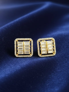 Close-up of an ornate Western (Silver Polish) Studs Earrings with American Diamonds. western dress styled with lightweight artificial American Diamond Studs earrings. “Comfortable to wear at home or in the office as well.”