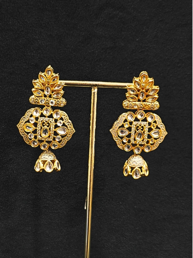Close-up of an ornate traditional Grey Meenakari gold Long jewellery set and earrings with Kundan, Meenakari work, crystal beads, pearls and American Diamonds. Wedding function styling with a premium Meenakari imitation necklace. Perfect Meenakari necklace set for weddings and festivals.