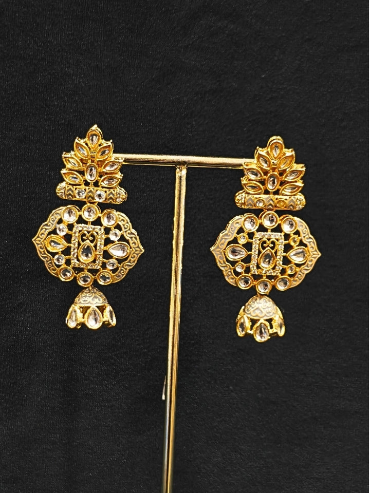 Close-up of an ornate traditional Grey Meenakari gold Long jewellery set and earrings with Kundan, Meenakari work, crystal beads, pearls and American Diamonds. Wedding function styling with a premium Meenakari imitation necklace. Perfect Meenakari necklace set for weddings and festivals.