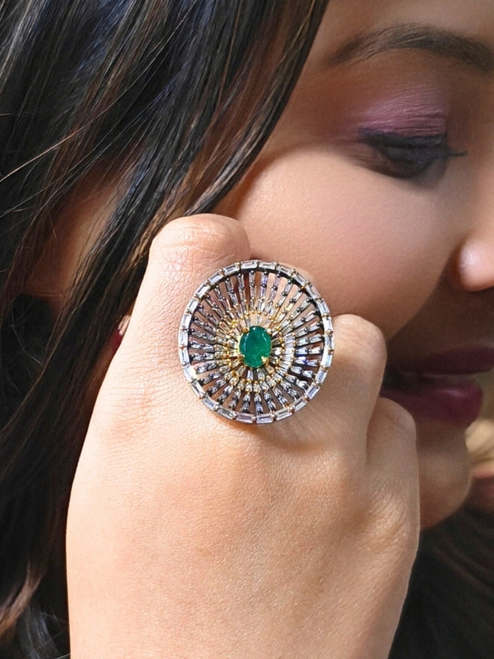 Close-up of a woman wearing an ornate Indo-Western (Black Polish Victorian Finish) Green Diamond Ring with American Diamond and Colored Stones. Close-up of a cocktail party look featuring a premium American diamond Ring. Close-up shot of a high-quality American diamond artificial Ring worn for festive celebrations.