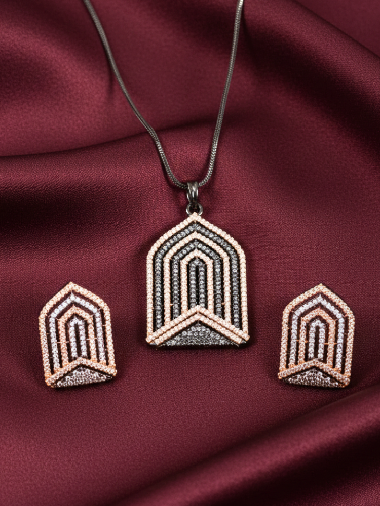 Close-up of an ornate Western Purple and Pink (Black Polish Victorian Finish) Diamond jewellery set and earrings with American Diamonds and Close-Setting. Close-up of a cocktail party look featuring a premium American diamond necklace.
