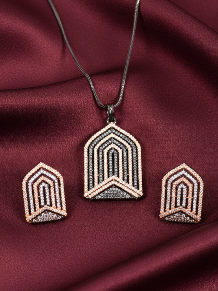 Close-up of an ornate Western Purple and Pink (Black Polish Victorian Finish) Diamond jewellery set and earrings with American Diamonds and Close-Setting. Close-up of a cocktail party look featuring a premium American diamond necklace.