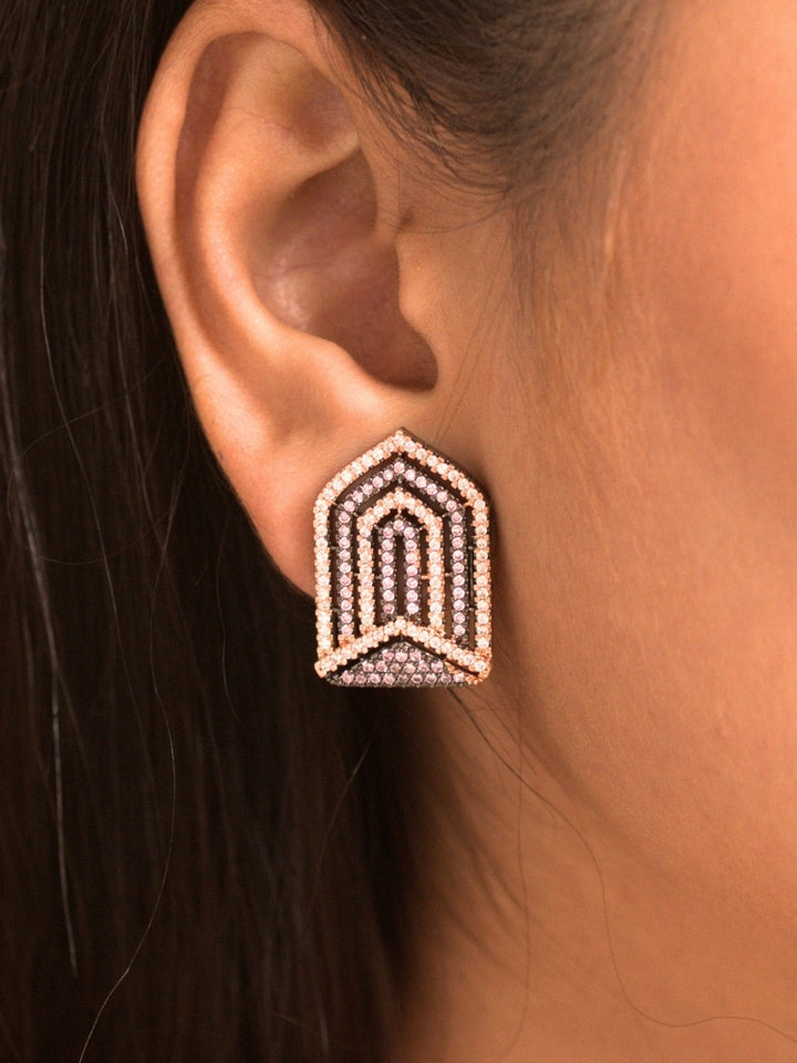 Close-up of a woman wearing an ornate Western Purple and Pink (Black Polish Victorian Finish) Diamond jewellery set and earrings with American Diamonds and Close-Setting. Close-up of a cocktail party look featuring a premium American diamond necklace.