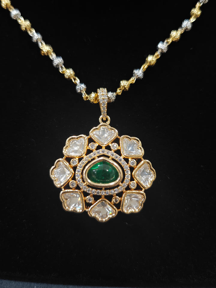 Close-up of an ornate Indo-western Green (Carat Polish) Diamond Pendant set and earrings with American Diamonds, Colored Stones and Moissanite. Elegant festive look with a high-quality imitation American diamond Pendant set. Close-up of high-quality  artificial American Diamond necklace craftsmanship.