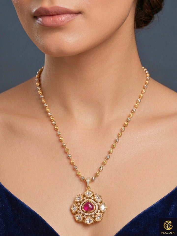 Close-up of a woman wearing an ornate Indo-western Ruby Pink (Carat Polish) Diamond Pendant set and earrings with American Diamonds, Colored Stones and Moissanite. Elegant festive look with a high-quality imitation American diamond Pendant set. Close-up of high-quality  artificial American Diamond necklace craftsmanship.