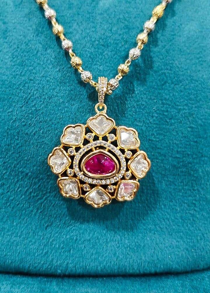 Close-up of an ornate Indo-western Ruby Pink (Carat Polish) Diamond Pendant set and earrings with American Diamonds, Colored Stones and Moissanite. Elegant festive look with a high-quality imitation American diamond Pendant set. Close-up of high-quality  artificial American Diamond necklace craftsmanship.