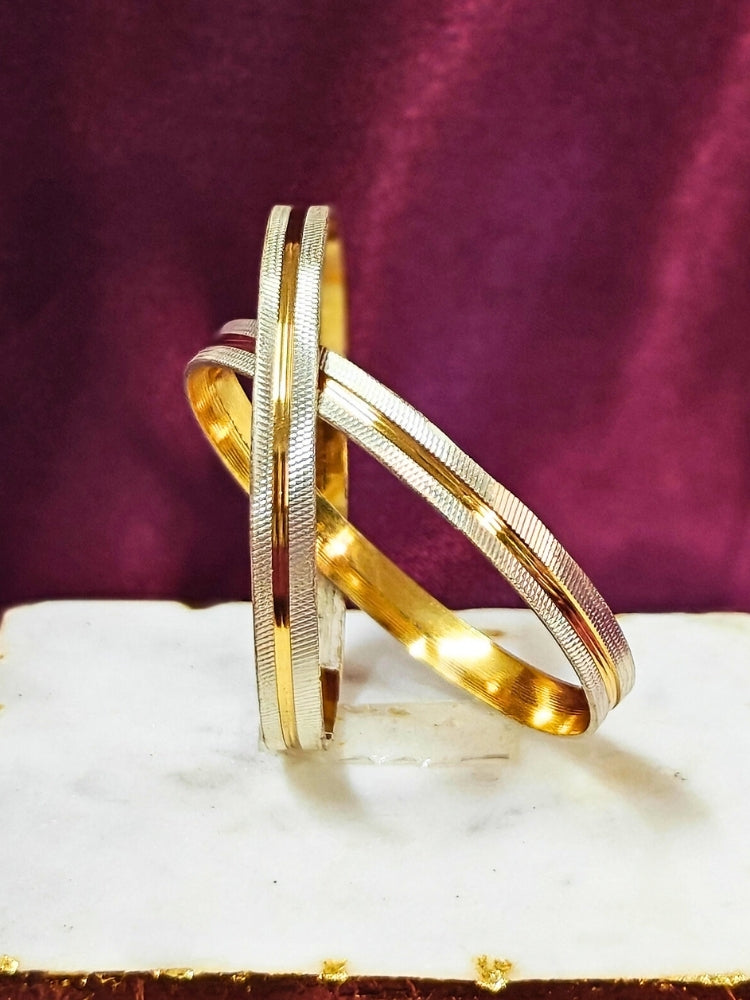 Close-up of an ornate traditional (Gold Polish) White Bangles Set. It’s comfortable and lightweight enough for everyday wear, and it also looks absolutely beautiful and elegant. The design is stylish, the finish is impressive, and it feels really pleasant to wear all day.