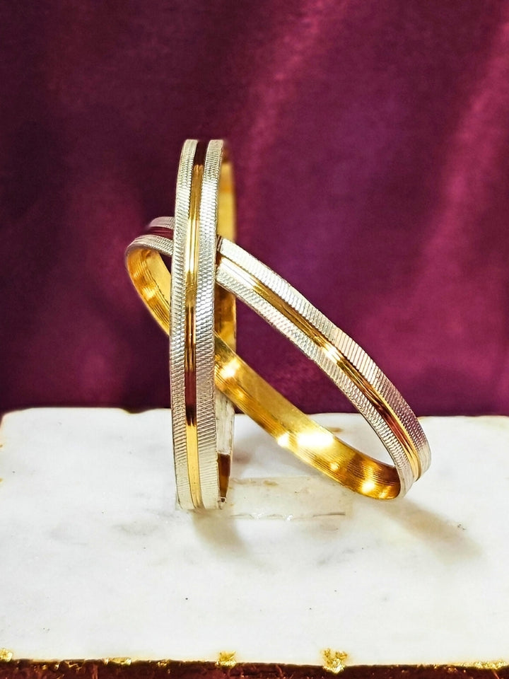 Close-up of an ornate traditional (Gold Polish) White Bangles Set. It’s comfortable and lightweight enough for everyday wear, and it also looks absolutely beautiful and elegant. The design is stylish, the finish is impressive, and it feels really pleasant to wear all day.