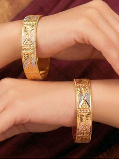 Close-up of an a women wearing ornate traditional (Gold Polish) Bangles Set. It’s comfortable and lightweight enough for everyday wear, and it also looks absolutely beautiful and elegant. The design is stylish, the finish is impressive, and it feels really pleasant to wear all day.