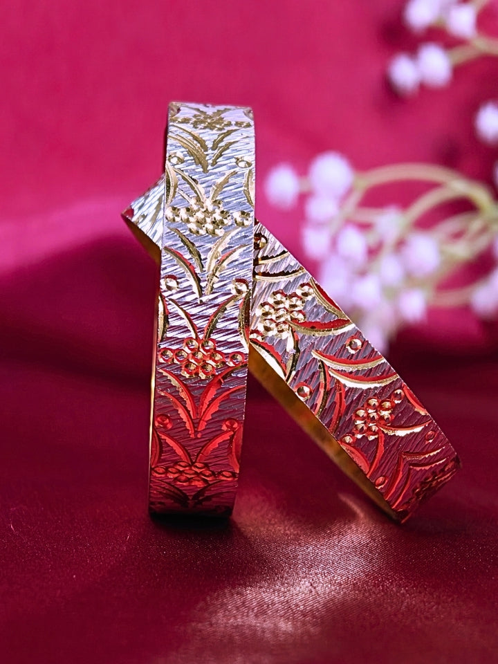 Close-up of an ornate traditional (Gold Polish) Gold & Silver Bangles Set. It’s comfortable and lightweight enough for everyday wear, and it also looks absolutely beautiful and elegant. The design is stylish, the finish is impressive, and it feels really pleasant to wear all day.