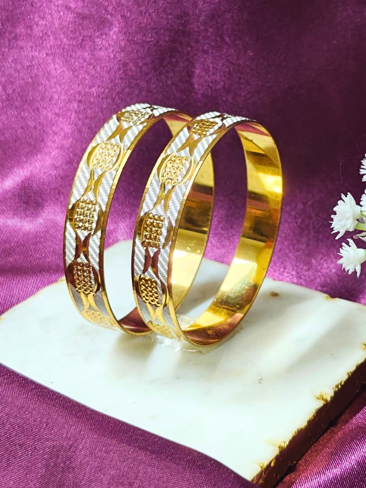 Close-up of an ornate traditional (Gold Polish) Gold & Silver Bangles Set. It’s comfortable and lightweight enough for everyday wear, and it also looks absolutely beautiful and elegant. The design is stylish, the finish is impressive, and it feels really pleasant to wear all day.