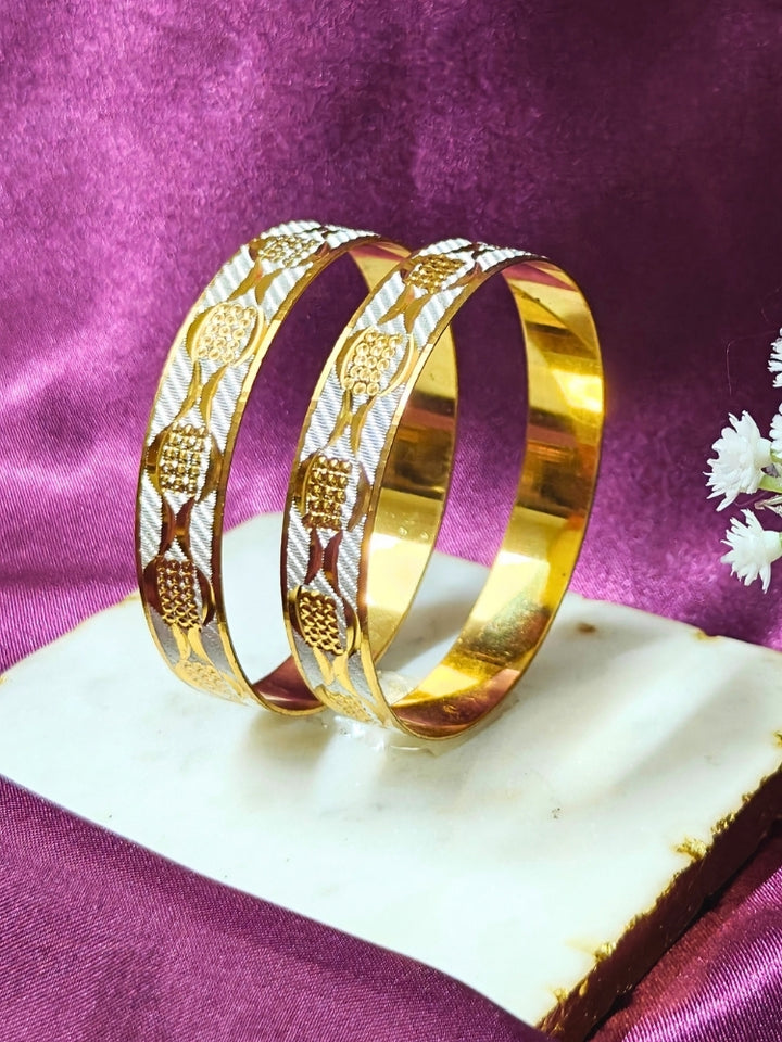 Close-up of an ornate traditional (Gold Polish) Gold & Silver Bangles Set. It’s comfortable and lightweight enough for everyday wear, and it also looks absolutely beautiful and elegant. The design is stylish, the finish is impressive, and it feels really pleasant to wear all day.