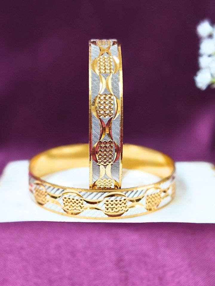 Close-up of an ornate traditional (Gold Polish) Gold & Silver Bangles Set. It’s comfortable and lightweight enough for everyday wear, and it also looks absolutely beautiful and elegant. The design is stylish, the finish is impressive, and it feels really pleasant to wear all day.