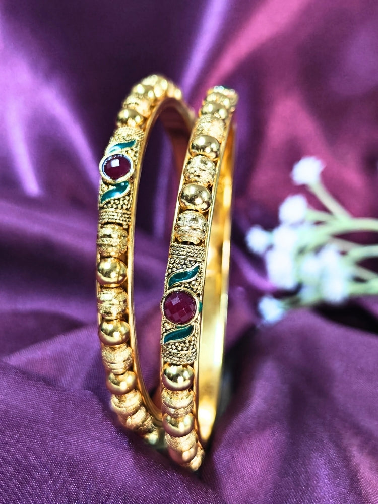 Close-up of an ornate traditional (Gold Polish) White Bangles Set. It’s comfortable and lightweight enough for everyday wear, and it also looks absolutely beautiful and elegant. The design is stylish, the finish is impressive, and it feels really pleasant to wear all day.