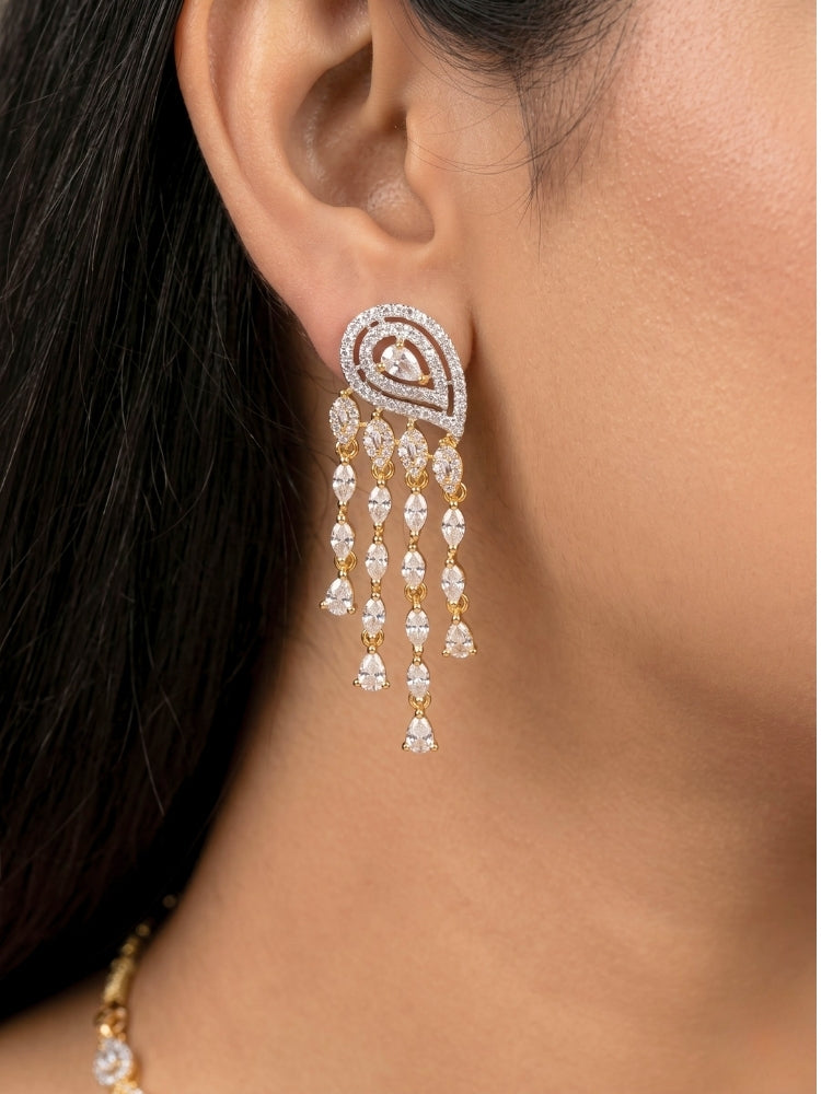 Close-up of a women wearing an ornate Western (Dual Tone) Gold & Silver Collar jewellery set and earrings with American Diamond. Party wear outfit completed with a lightweight American diamond necklace. Close-up of a cocktail party look featuring a premium American diamond necklace.
