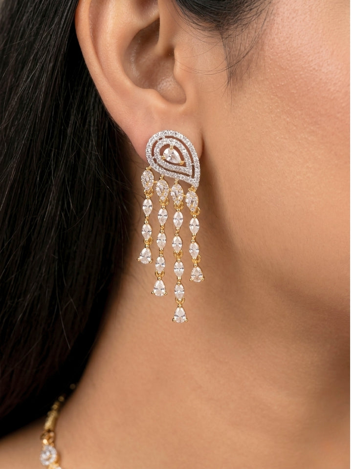 Close-up of a women wearing an ornate Western (Dual Tone) Gold & Silver Collar jewellery set and earrings with American Diamond. Party wear outfit completed with a lightweight American diamond necklace. Close-up of a cocktail party look featuring a premium American diamond necklace.