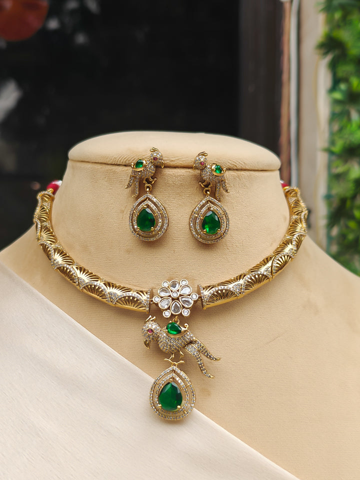 "Close-up of a model in luxurious artificial diamond jewelry featuring a designer diamond and green colored stone hasli necklace and earrings set, crafted for bridal fashion and high-end weddings. This beautiful diamond jewelry set offers the brilliance of real diamonds at an affordable price."

