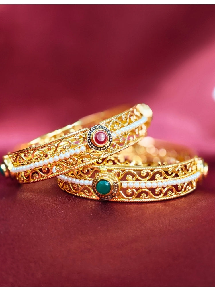 Close-up of an ornate traditional (Gold Polish) Bangles Set. It’s comfortable and lightweight enough for everyday wear, and it also looks absolutely beautiful and elegant. The design is stylish, the finish is impressive, and it feels really pleasant to wear all day.