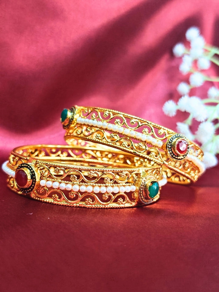 Close-up of an ornate traditional (Gold Polish) Bangles Set. It’s comfortable and lightweight enough for everyday wear, and it also looks absolutely beautiful and elegant. The design is stylish, the finish is impressive, and it feels really pleasant to wear all day.