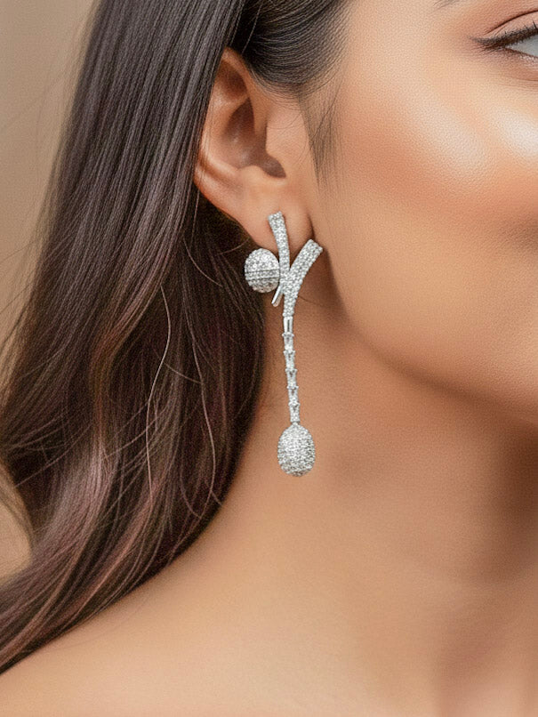 "A beautiful woman wearing an elegant artificial diamond necklace and matching earrings. This premium artificial diamond jewelry set is perfect for special occasions, from Indian weddings to engagement parties, offering sophisticated glamour without the high price tag."
