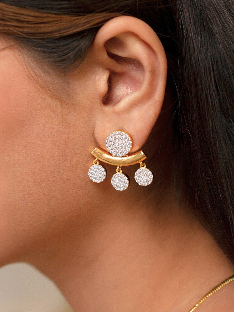 The Lunessa Necklace Set features gold and white tones with round American Diamonds, sparkling atop black velvet. This elegant accessory for cocktail gowns comes beautifully presented in a golden box.