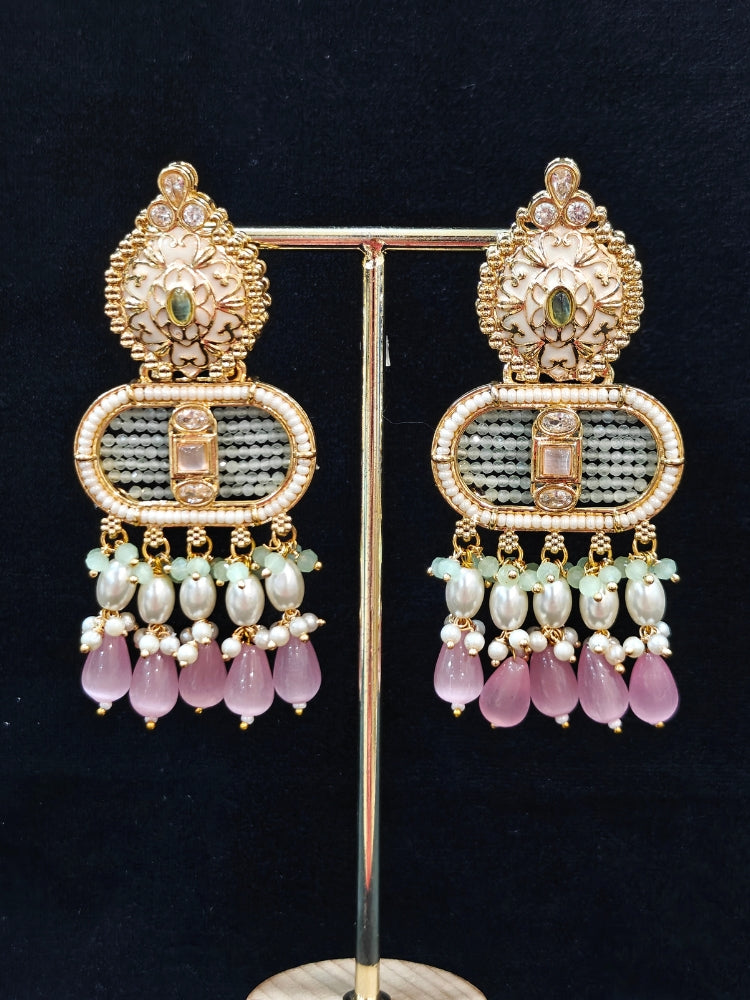 Close-up of an ornate traditional Mint Pink and Green Rajwadi gold Long jewellery set and earrings  with  Pearls, Tumble Beads, Meenakari, Moissanite Kundan, Bandhai Work and Hydro Crystals. Close-up of a handcrafted Rajwadi artificial jewelry set . Elegant  look with a traditional Rajwadi artificial necklace. Close-up of a premium Rajwadi artificial necklace under 10000.
