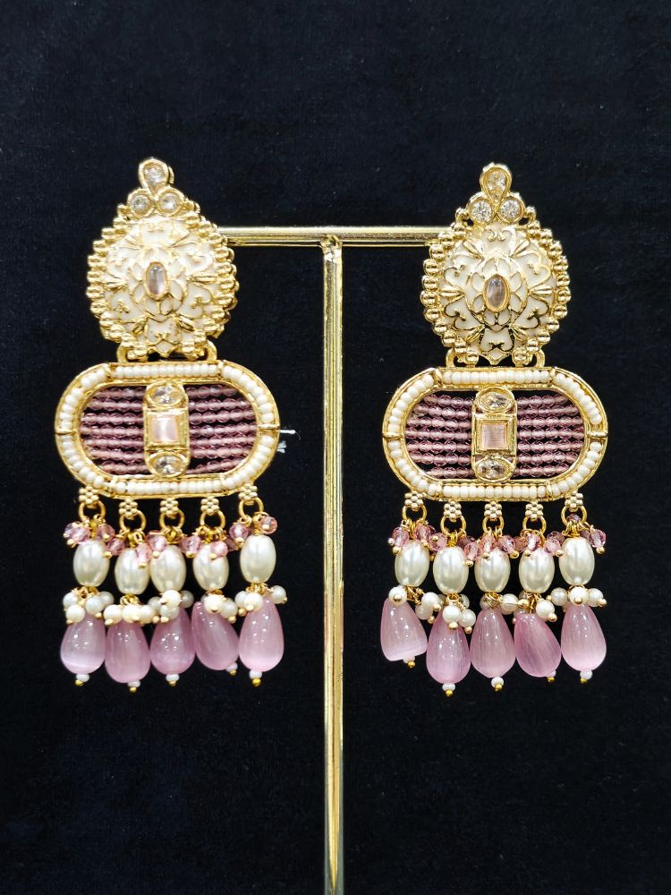 Close-up of an ornate traditional Mint Pink Rajwadi gold Long jewellery set and earrings  with  Pearls, Tumble Beads, Meenakari, Moissanite Kundan, Bandhai Work and Hydro Crystals. Festive look completed with a luxury Rajwadi imitation necklace.  Perfect Rajwadi necklace set for weddings and festivals.