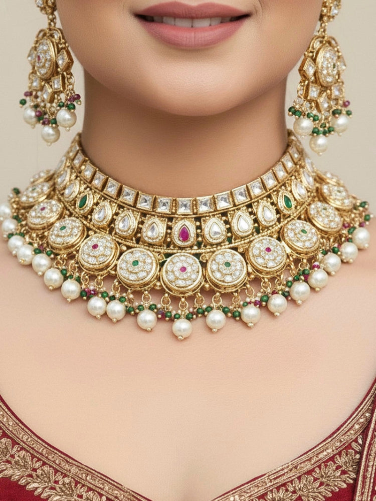 Close-up of a woman wearing an ornate traditional Rajwadi and Heritage gold Choker jewellery set and earrings and maangtikka with Pearls, Hydro Crystal and Moissanite Kundan. Bride wearing a premium Rajwadi necklace with a Lehenga for her reception. Royal bridal look completed with a statement heritage necklace set.