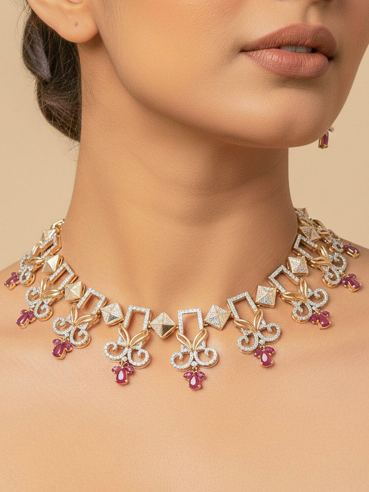 Close-up of a woman wearing an ornate Indo-western American Diamond Ruby Pink Gold Collar jewellery set and earrings with American Diamond and Ruby Pink Colored Stones. Party wear outfit completed with a lightweight American diamond necklace. 