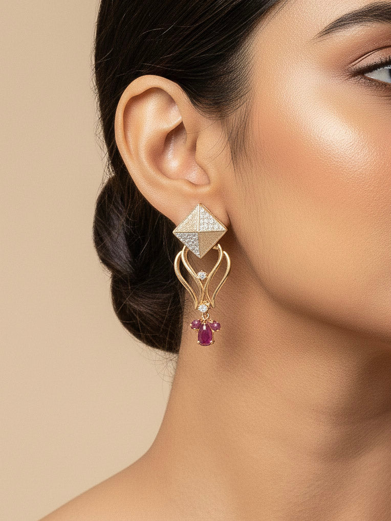 Close-up of a woman wearing an ornate Indo-western American Diamond Ruby Pink Gold Collar jewellery set and earrings with American Diamond and Ruby Pink Colored Stones. Party wear outfit completed with a lightweight American diamond necklace. 