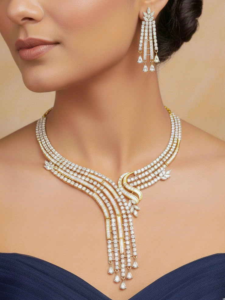 Close-up of a woman wearing an ornate Western gold Diamond Collar jewellery set and earrings with American Diamond. Woman styling a statement American diamond necklace with an off-shoulder gown for a reception. 