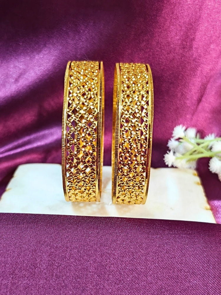 Close-up of an ornate traditional (Gold Polish) Bangles Set. It’s comfortable and lightweight enough for everyday wear, and it also looks absolutely beautiful and elegant. The design is stylish, the finish is impressive, and it feels really pleasant to wear all day.
