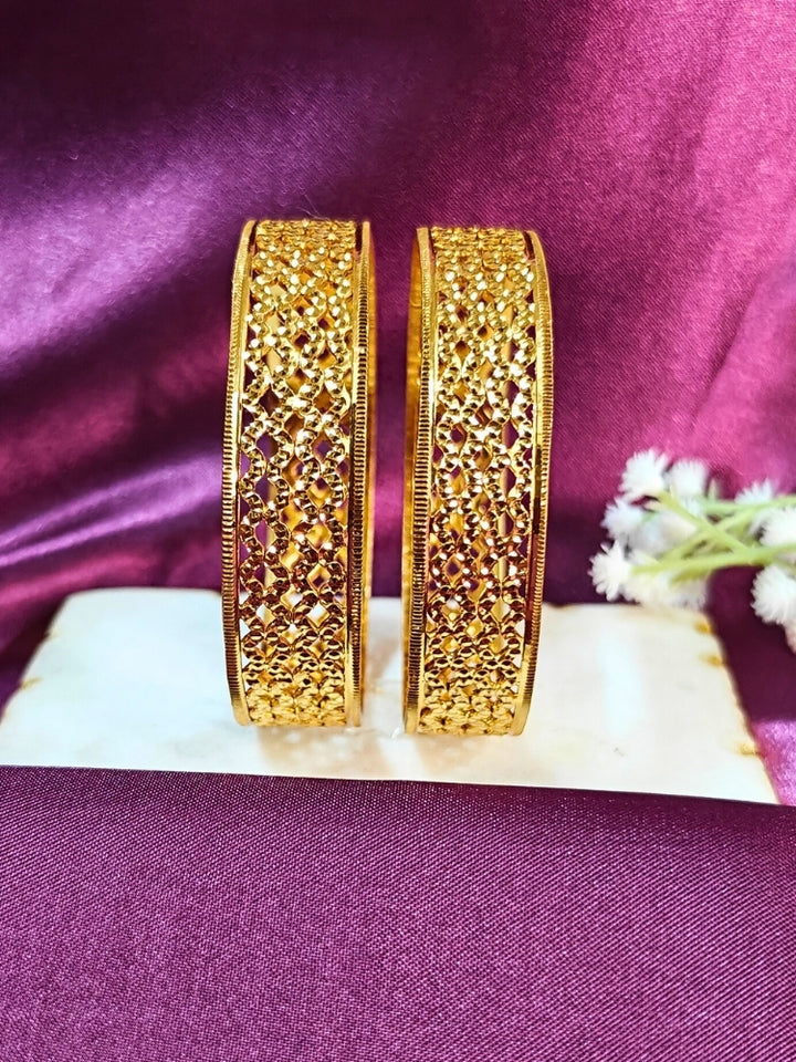 Close-up of an ornate traditional (Gold Polish) Bangles Set. It’s comfortable and lightweight enough for everyday wear, and it also looks absolutely beautiful and elegant. The design is stylish, the finish is impressive, and it feels really pleasant to wear all day.